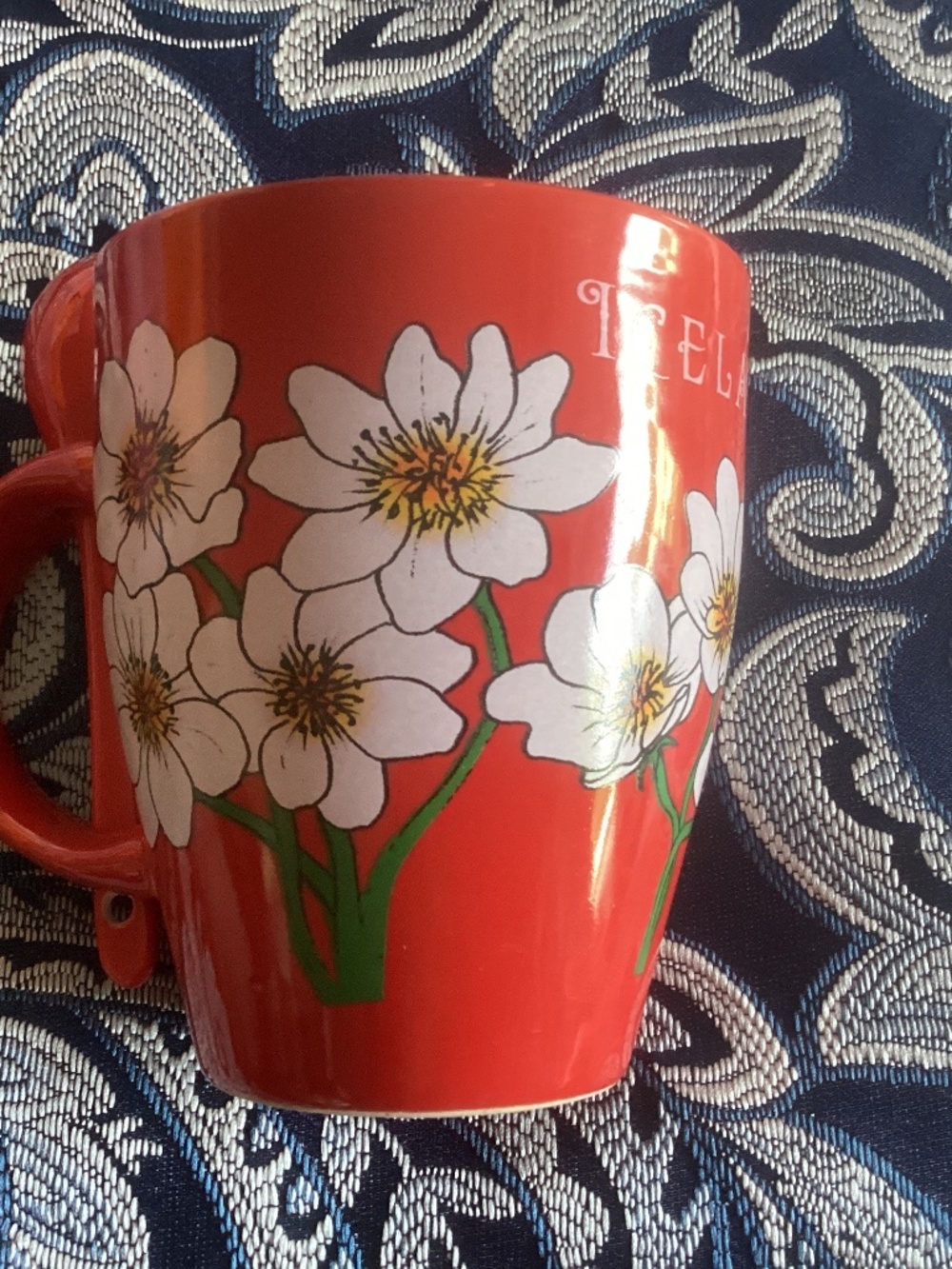 Brand new ICELAND red mug with spoon